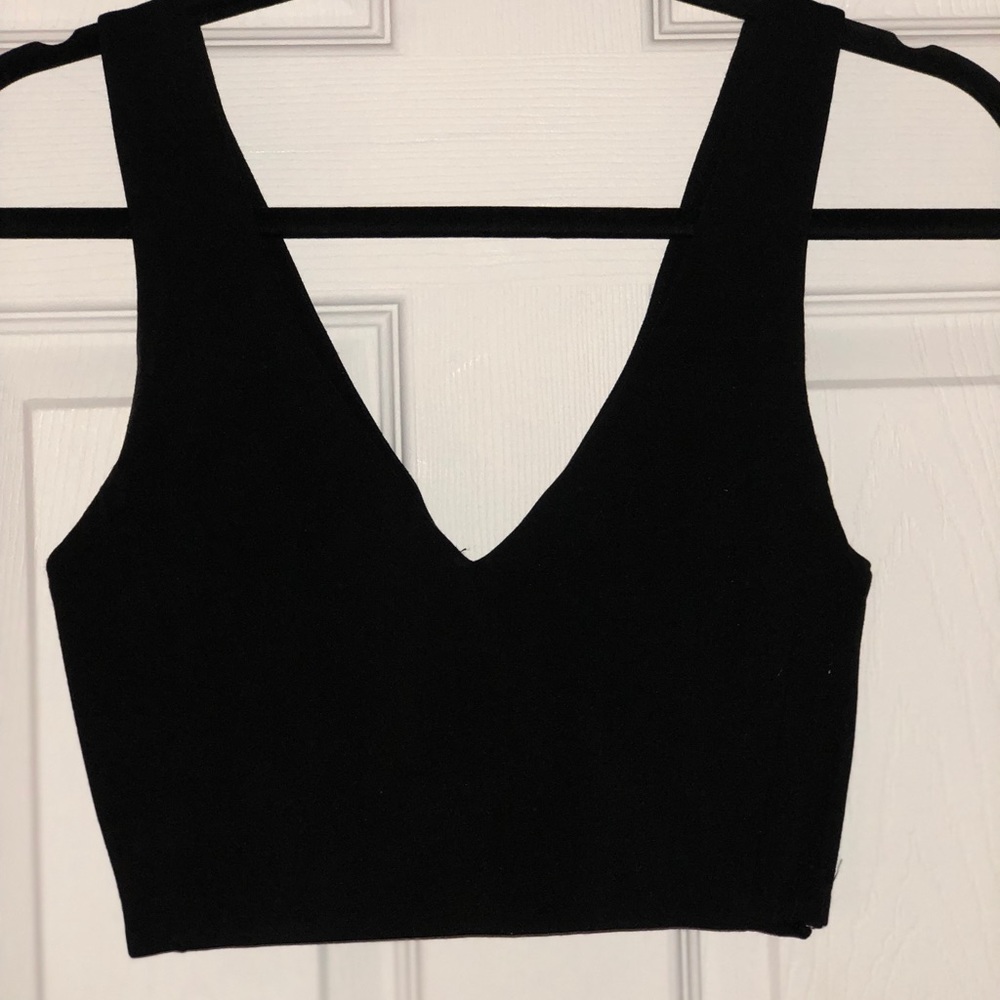 Black tank crop top.